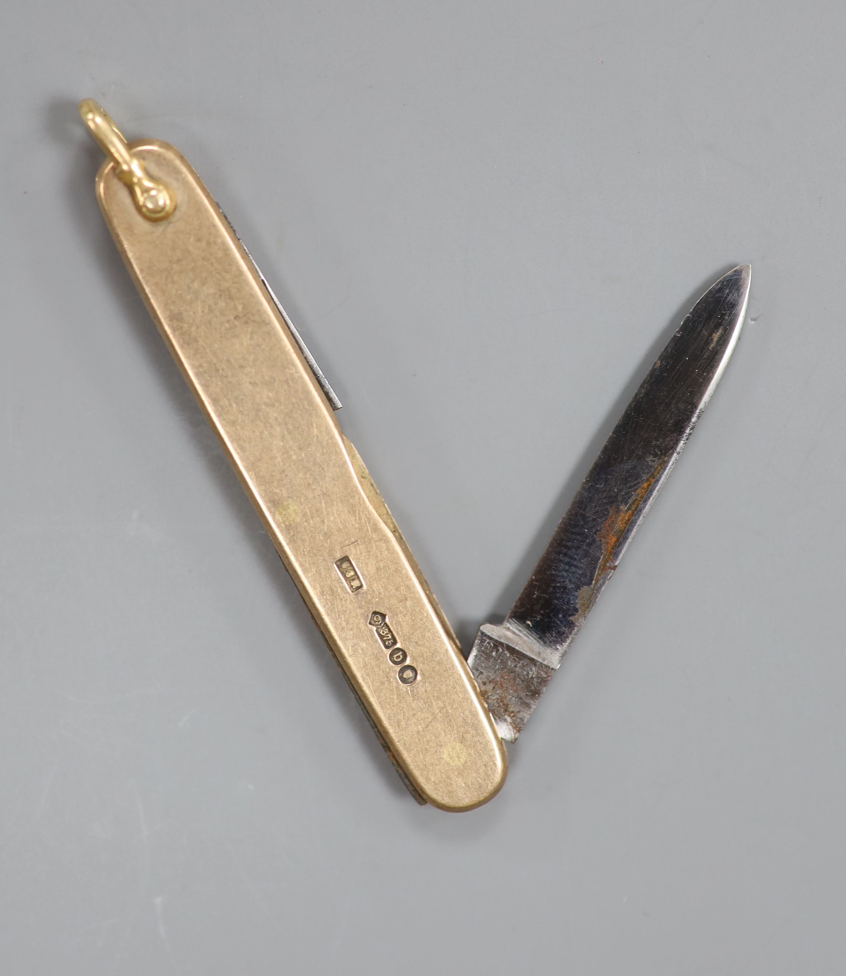 A late Victorian 9ct gold mounted pocket knife, 57mm, gross 15.2 grams.